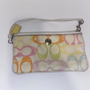 Multicolor coach wristlet needs a little tlc